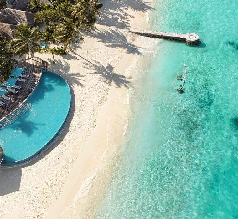 Aerial view of Solis Pool Bar over looking the ocean at Nova Maldives