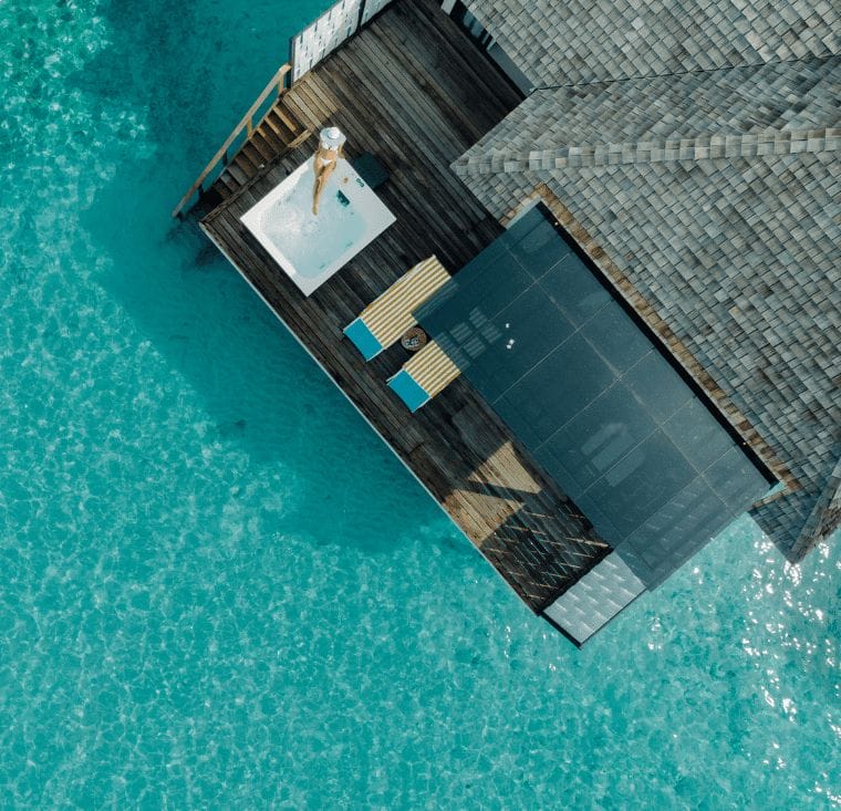 Exterior of water villa with jacuzzi at Nova Maldives