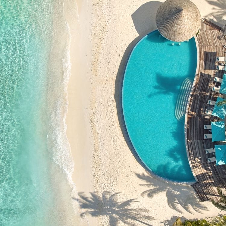 Aerial view of Solis Pool Bar over looking the ocean at Nova Maldives
