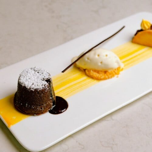 a plate of desserts on a table