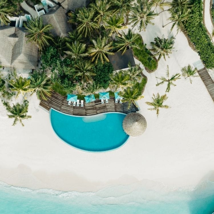 Aerial view of Solis Pool Bar over looking the ocean at Nova Maldives