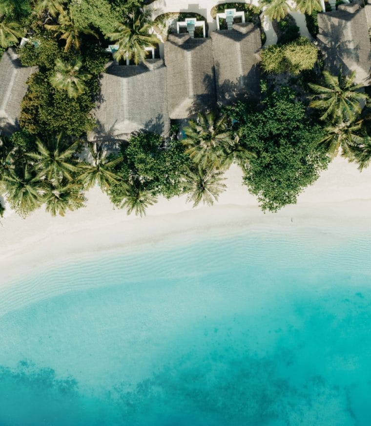 Aerial of the beach villas and white sandy beaches at Nova Maldives