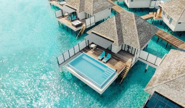 Exterior of water villa with private pool at Nova Maldives