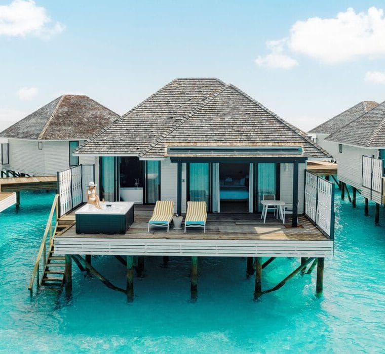 Exterior of water villa with jacuzzi at Nova Maldives