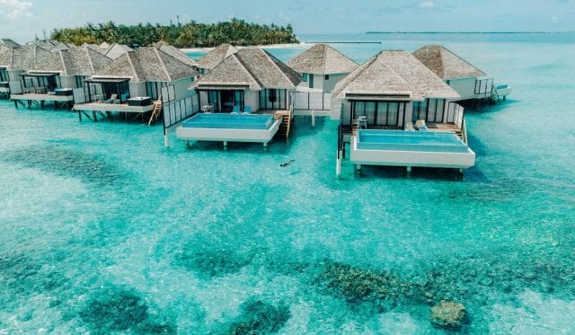 Aerial of water pool villas at Nova Maldives