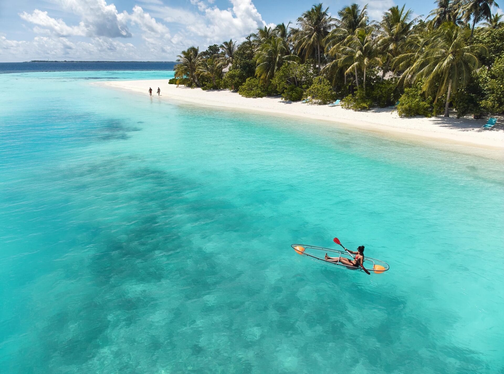 A person kayaking in a lagoon